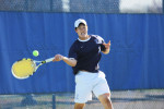 John Huang ’13, above, and Patrick Chase ’14 dominated at No. 2 with an 8–6 win against Dartmouth last Friday.