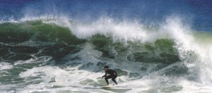 Dan Cooper '05 takes advantage of the surf in Narragansett, R.I., Saturday. Hurricane Fabian brought unusually big waves to the New England coastline this weekend.