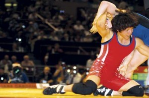 Patricia Miranda LAW '08 competes in the first-ever women's freestyle at the Pan-American Games in the Domincan Republic on Aug. 5. Miranda won the gold in the 105.5 weight category. She is now training for the 2004 Summer Olympics in Colorado Springs, deferring her enrollment in the Law School for one year.