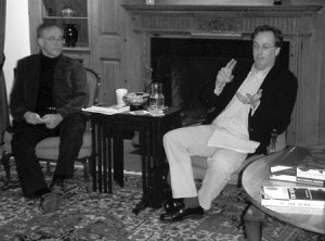 Media critic William McGowan (right) speaks Wednesday at a Branford College Master’s Tea, as political science professor Jim Sleeper, who invited McGowan to speak on campus, listens. McGowan’s recently published book, which contains case studies of misreported stories, sits on a coffee table in the foreground.