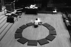 A member of Lotus, one of the Buddhist societies on campus, sets up for a meditation session in the art space in Trumbull College, where the group has traditionally met. However, it has had problems with reserving a regular space for its thrice-weekly meditations, and is seeking a permanent location for worship.
