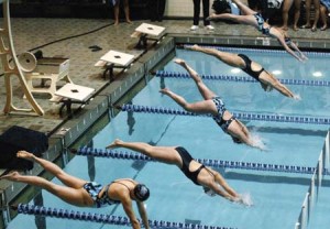 Eli swimmers hit the water to begin a race against Columbia Nov. 12 at Kiphuth Pool. The Bulldogs avenged last year’s loss to the Lions with a solid 177-123 decision. After a rigorous winter break, the Bulldogs traveled to Orono, Maine and defeated the Black Bears 161-139 Sunday afternoon.