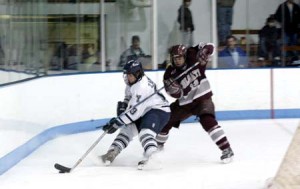Yale forward Joe Zappala ’06 fights off Colgate’s Justin Spencer in Friday’s game against the No. 11 Raiders at the Ingalls Rink. The game was a defensive gem as the two teams skated to a 0-0 overtime draw. Goalie Matt Modelski ’07 stopped all 26 shots he saw on the night. Yale dropped a tough 5-2 decision to No. 5 Cornell the following day.