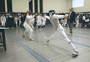 A member of the men’s fencing team lunges in a bout against Brandeis Jan. 19 at Payne Whitney Gymnasium. The Elis ended what has been a trying season with a fifth place finish at this weekend’s Intercollegiate Fencing Association Championships in Providence, R.I. Also competing at IFAs, the women’s team took fifth and the coed team came in fourth.