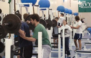 Yale athletes work out in the varsity weight room at Payne Whitney Gymnasium. While performance-enhancing drugs have obvious allure, several Yale athletes said the potential benefits are significantly outweighed by the potential consequences. Elis also said they can be frustrated with the inconvenience of random testing.