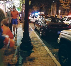 Police escort partyers out of Toad’s Place on Oct. 31. The popular nightclub recently reached a compromise with the state on its charges of underage drinking.