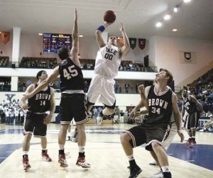 Forward Ross Morin ’09 gets a shot off over the Brown defense. Morin had 12 points in the Elis’ 76-71 loss to Ivy foe Brown on Saturday.