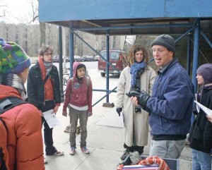 Students gather outside Payne Whitney on Feb. 13 before demanding that the Athletics Department pressure New England Linen Supply to improve its labor practices.
