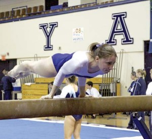 Kristen Campbell ’08 goes horizontal during a balance beam routine at the Elis’ Saturday meet against URI. The meet against the Rams was the last warm-up before Yale heads to Penn for the Ivy Championship on Sunday.