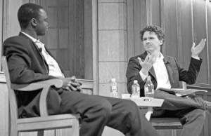 Author Dave Eggers (R) and Valentino Achak Deng, a refugee from Sudan, discuss Eggers’ novel based on Deng’s life, “What is the What.”
