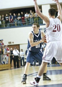 Forward Ross Morin ’09 looks for an open teammate during the men’s basketball team’s 86-71 trouncing of Harvard at home on Feb. 17.