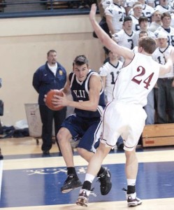 Swingman Travis Pinick ’09 looks for an open lane during the Elis’ Feb. 17 win against Harvard at John J. Lee Amphitheater. Last Saturday, Pinick’s last-second layup sealed a 52-51 win over Princeton and a second-place conference finish.