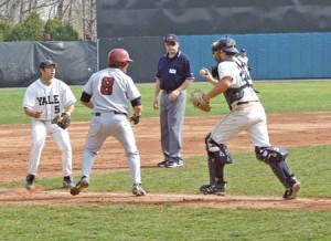 A Harvard runner prepares to meet his demise, stuck in a pickle between catcher Eric Rasmussen ’06 and shortstop Dan Soltman ’08 last season at Yale Field.