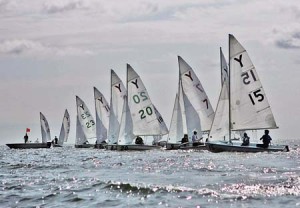 Yale boats line up at full sail in Long Island Sound during the Yale Radial Open last Sept. 10. After a series of big finishes in February and March, the Elis have claimed a No. 1 national ranking.