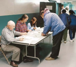 People vote in the 2006 aldermanic race. Connecticut 17-year-olds may be able to vote in state primaries if an amendment is passed.