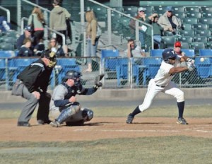 Yale centerfielder Josh Cox squares around to bunt in the bottom of the third of the Elis’ game against Connecticut last Wednesday. On the road this weekend, the team split a doubleheader in Ithaca on Saturday but lost two tantalizingly close battles against Princeton yesterday afternoon.