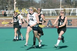 Midfielder Lauren Taylor ’08 outpaces the Massachusetts defense last Wednesday. This past weekend, the Elis rebounded from an 0-2 conference start with a 17-8 trouncing of Harvard in Cambridge. Taylor had six goals and two assists.