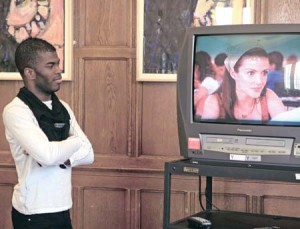 Graduate student Madison Moore discusses an episode of “Sex and the City” during his talk, “Your Proustian Guide to Gaydar,” on Monday. The event was part of Pride at Yale, which launched this week.