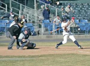 Justin Ankney ’07 begins his cut against an offering from a UConn Husky at Yale Field on March 28. The captain picked up 4 hits and 3 RBI in an invigorating Eli sweep of Columbia yesterday.
