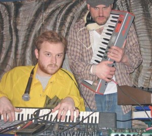 New Haven musicians Michael “Denny” Denisiewicz, left, and John Panos play local venues like Rudy’s to make ends meet.