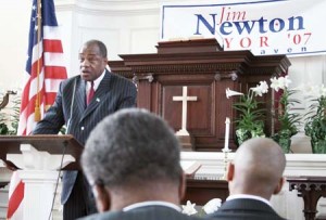 Former alderman Jim Newton speaks Saturday on the Green about the ‘crisis’ of New Haven’s current leadership as he begins his mayoral race.