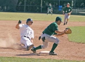 Stephen Miehls ’10 slides into third against Dartmouth on Saturday at Yale Field. The baseball team won three of four games against the Big Green this weekend.