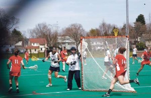 Defender Jess Champion ’08 and goaltender Ellen Cameron ’08 protect the Eli net from Cornell attackers during the No. 12 women’s lacrosse team’s 13-8 win. The Bulldogs now wait for the May 7 announcement of at-large bids to NCAAs.