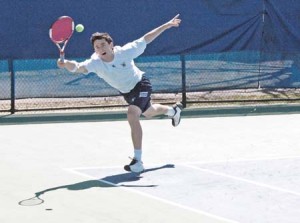 Rory Green ’08 stretches to get to the ball during last Friday’s matchup against Harvard’s Gideon Valkin. Green fell to Valkin in straight sets.