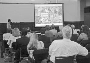 Those in attendance at the Shartenberg Project workshop review slides and plans for the future Chapel Street tower. Architects and city planners hope that the tower will attract more affluent renters to the downtown area.