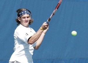 Jeff Dawson ’09, playing in the No. 3 spot against Harvard on Friday, follows through on a swing. The men’s tennis team rounded out its 2006-’07 Ivy campaign by coasting past Brown, 5-2, yesterday at the Cullman-Heyman Tennis Center.