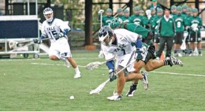 Middie Greg DuBoff ’08 guns it past a Dartmouth foe and goes in for the scoop April 18. The Bulldogs downed the Big Green, 15-12, to snap a four-game Ivy losing streak.