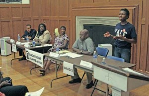 Aldermanic candidates from Wards 2 and 22 discuss current issues at the Afro-American Cultural Center on Tuesday night. It is the first time in recent history in which such a debate took place.