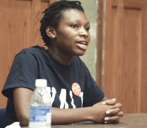 Ward 2 Alderwoman candidate Gina Calder, a recent graduate of Yale College and a student at the Yale School of Public Health, speaks at a debate at the Afro-American Cultural Center at Yale on Tuesday night.