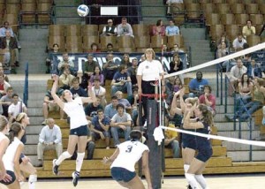 Outside hitter Kali Nelson ’08 swings at the ball during a Sept. 22 matchup against Rhode Island last fall. The volleyball team opens its season this weekend by hosting Rhode Island, Sacred Heart and Maine in the annual Yale Invitational.