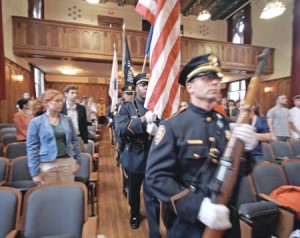 Officers stand at attention during the Sept. 11 Memorial Event at the SSS lecture hall yesterday. Keynote speaker Donald Kagan drew comment with a speech on patriotism that many saw as overly political.