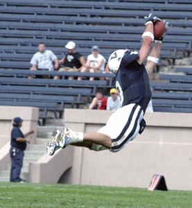 Wideout Chandler Henley ’07 pulls down a pass during the San Diego game last September. Henley is part of a corps of key receivers that graduated in May.
