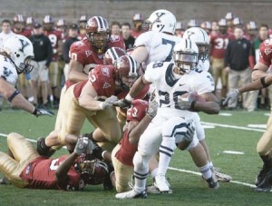 Mike McLeod ’09 evades Crimson defenders for a gain during Harvard-Yale last year, a familiar sight on a day when the All-Ivy tailback ran for three touchdowns.