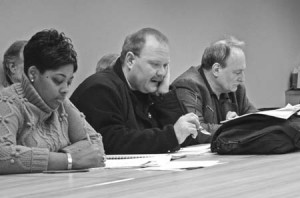 The aldermen, shown at a meeting on Feb. 21, are at odds over a new accountability plan proposed by the aldermen of wards 2 and 5. Board president Carl Goldfield asserts that the plan “takes the alderperson out of the equation.”