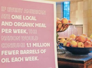 A poster created by the Yale Sustainable Food Project stands in the Berkeley dining hall. University Dining Services will not continue the month-long trial expansion of YSFP.