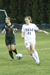 Captain Mary Kuder ’08 takes the ball downfield against Princeton last season. With a hard-fought win over BU last night, the Elis are primed for Ivy play.