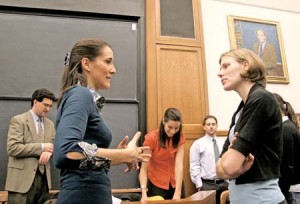 Panelists and students mingle after a discussion about Kosovo’s past and future. The event, held at the Law School on Tuesday, focused on the possibility of independence for the region, now a province of Serbia.