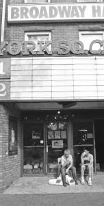 Visitors sit in front of the former York Square Cinemas, which closed summer 2005 and for which a new tenant has not been found.