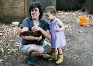 Rebecca Weiner '85 and her daughter Sarah hold a chicken they call their pet. A neighbor's complaint prompted a hearing of the Board of Zoning Appeals on Tuesday.