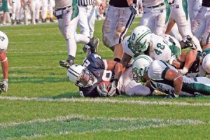 Mike McLeod ’09 falls short of the goal line against Dartmouth on Saturday. The back racked up 155 yards on the ground.