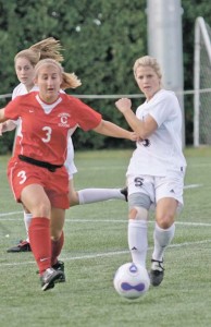 Forward Emma Whitfield ’10 moves the ball past a Cornell defender during Saturday’s game. Whitfield had a goal and an assist in the 5-0 win.