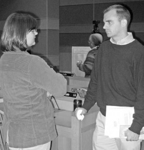 Ward 13 Alderman Alex Rhodeen talks with Ward 14 Alderwoman Erin Sturgis-Pascale. Last night’s meeting quickly passed all agenda items.