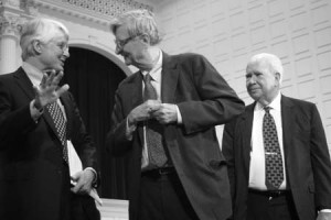 Edward Bass, left, moderated a debate at the Yale Peabody Museum yesterday between two biologists, who expounded on their view of a risky global future.
