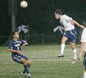 Eric Meyer ’11 moves the ball upfield against No. 2 UConn on Wednesday night. The team lost the game 2-1, but the Eli offense continued to show signs of life.