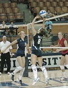 Outside hitter Kali Nelson ’08 spikes against Cornell on Oct. 19. With two league wins this weekend, Nelson and the Elis moved into second.