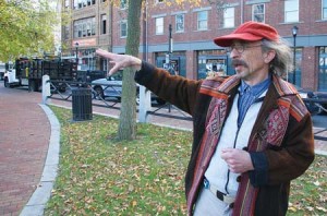Stephen Kobasa, who is the main force behind a memorial to the Iraq war, stands at its planned location next to the 1905 Broadway Civil War Memorial.